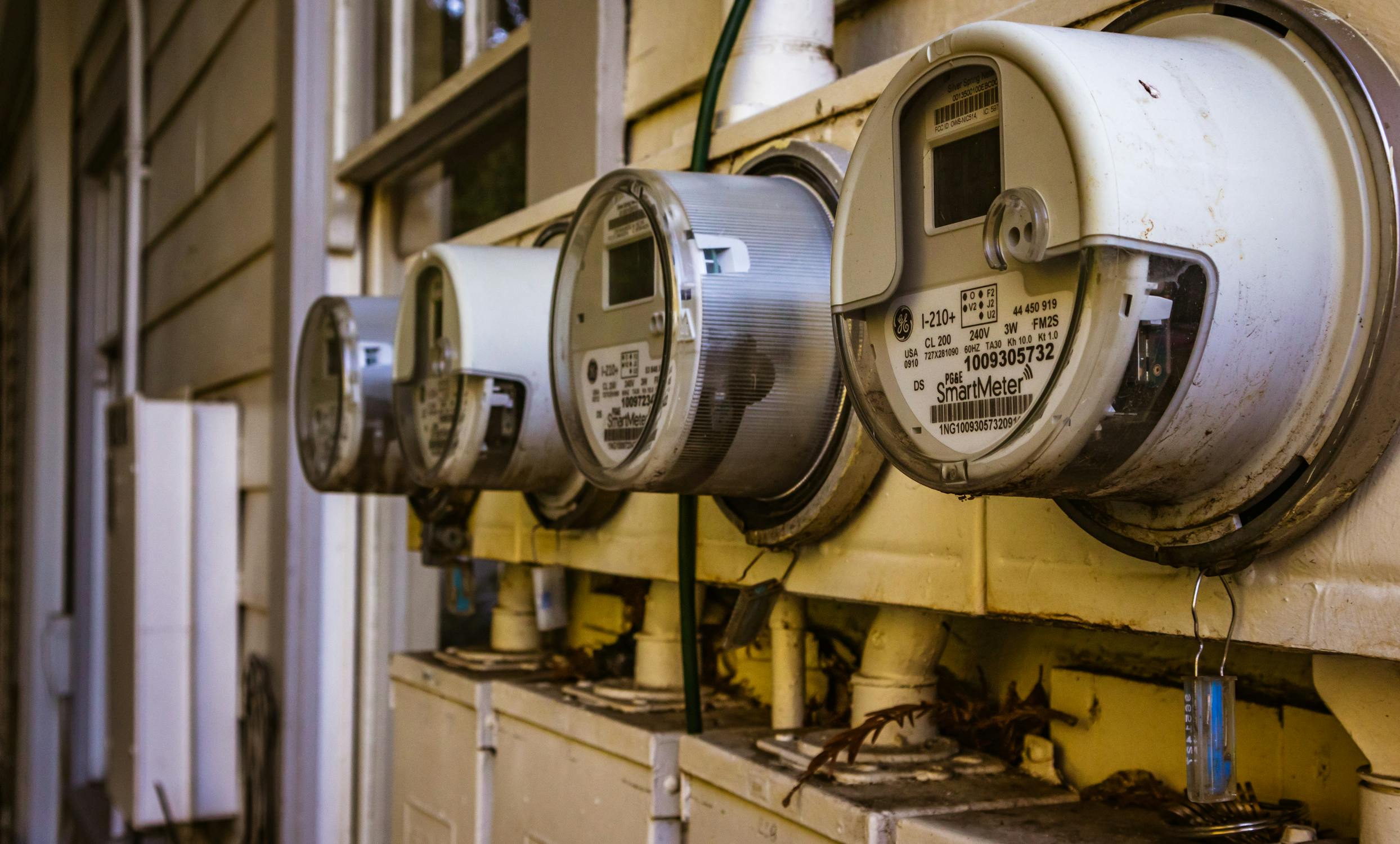 Smart electricity meters on a residential wall
