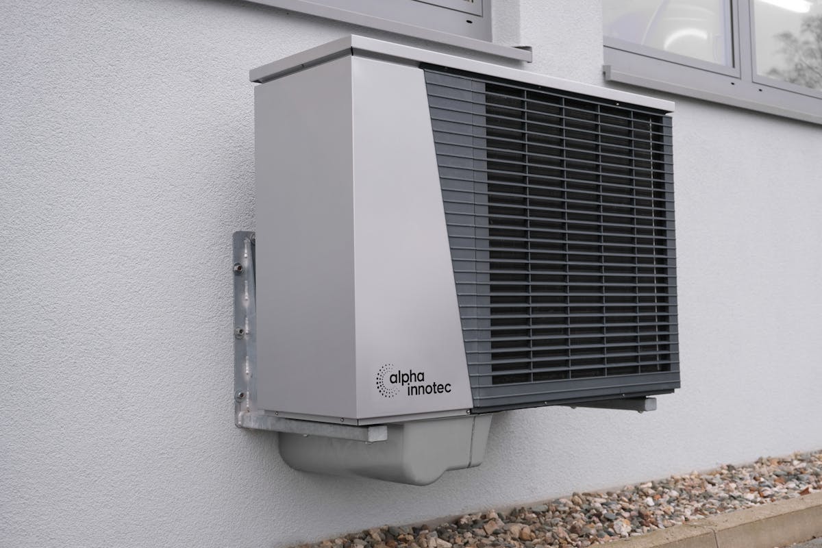 Close-up of a heat pump outdoor unit
