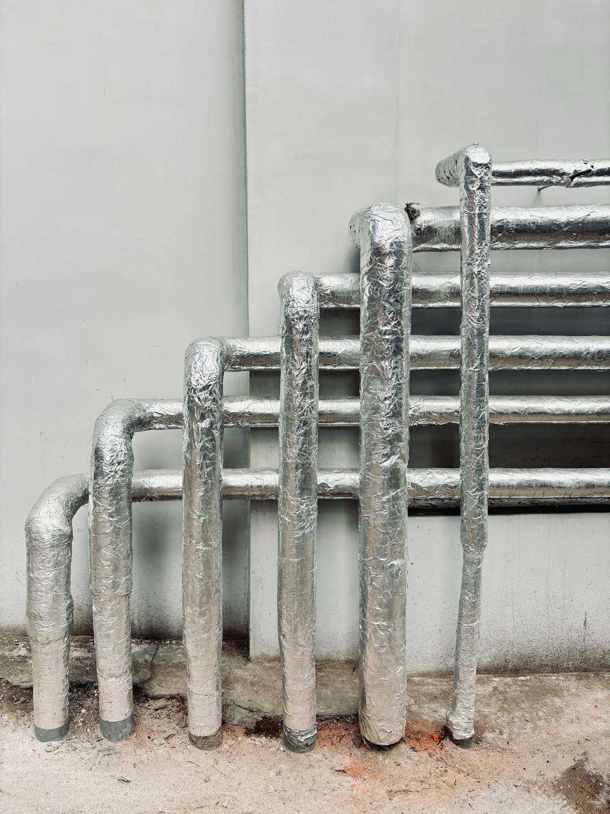 Insulated exterior pipes on a building