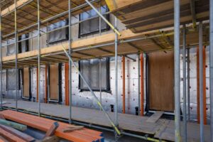 Home insulation being installed on building