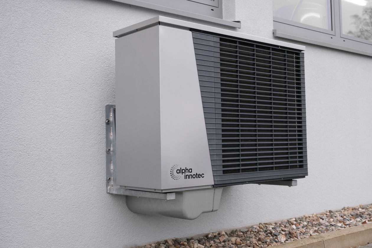 Air source heat pump installed outside a UK home