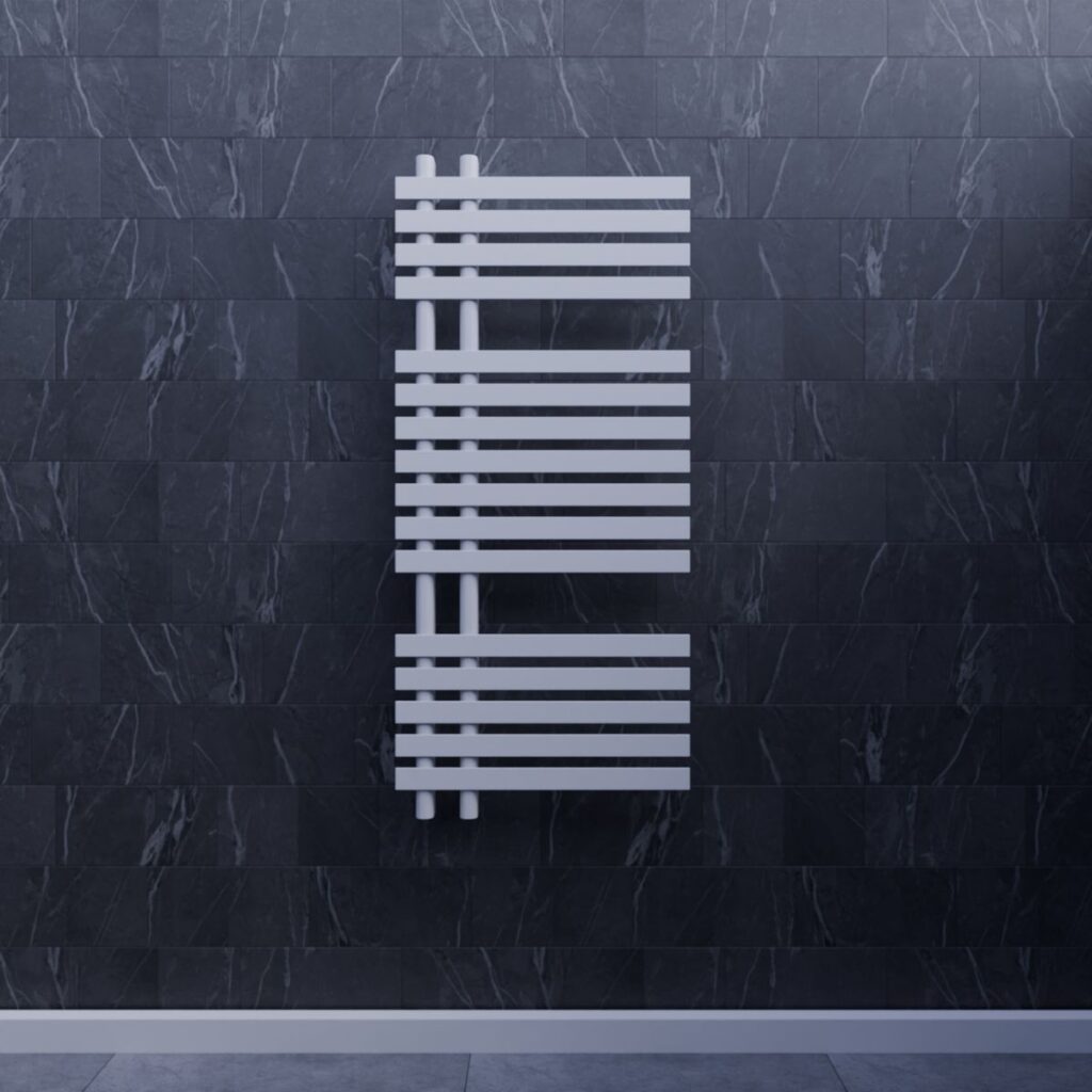 Heated towel rail on a bathroom wall