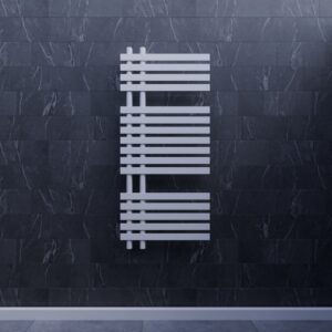 Heated towel rail on a bathroom wall
